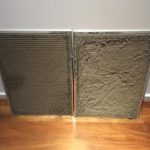 An example of dirty air conditioner filters covered in dust