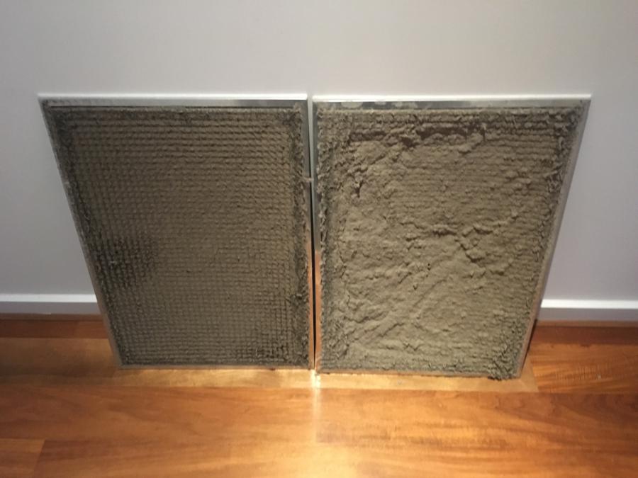 An example of dirty air conditioner filters covered in dust