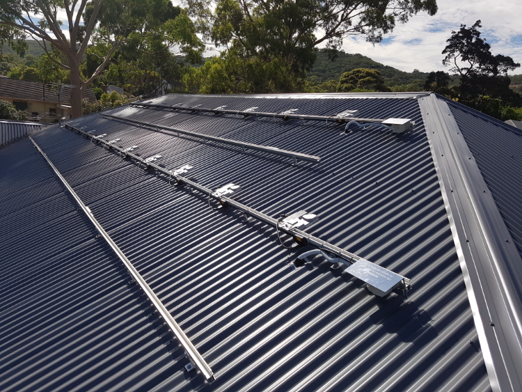 Installed Micro Inverters on a tin roof. 