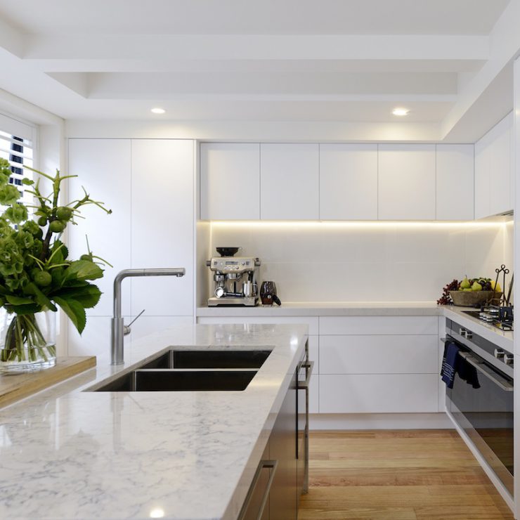 LED Lighting strip under floating cabinets in a kitchen