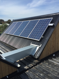 Solar panels installed on a roof with a very steep pitch