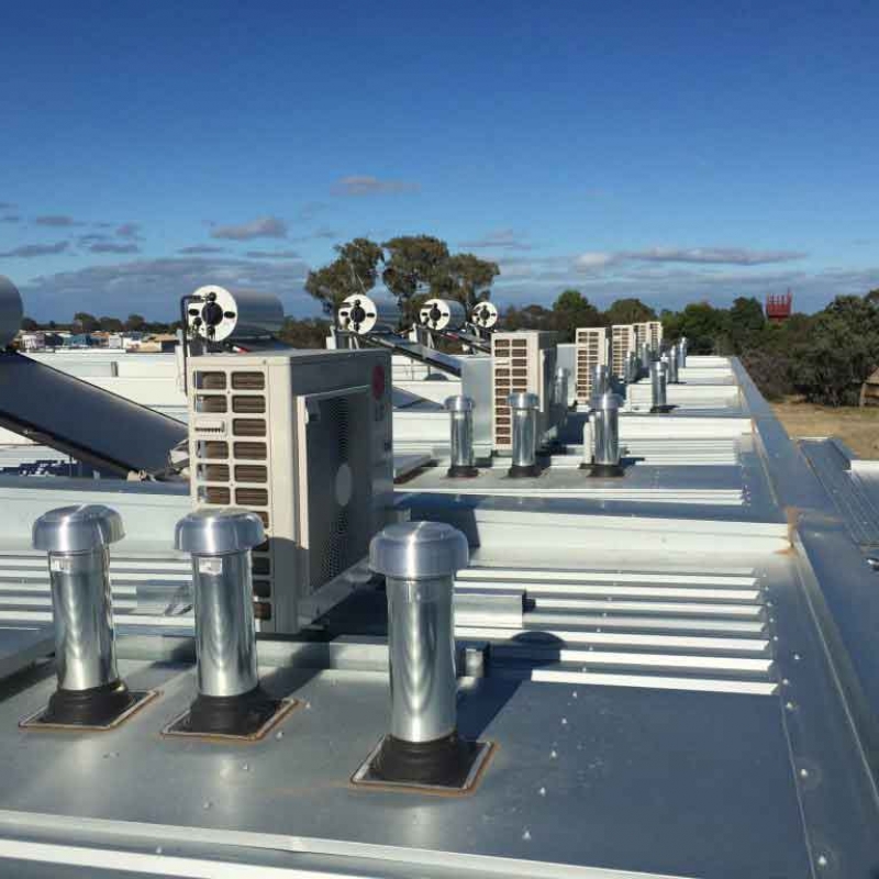 Evaporative Air Conditioner outdoor units installed on a roof in a row